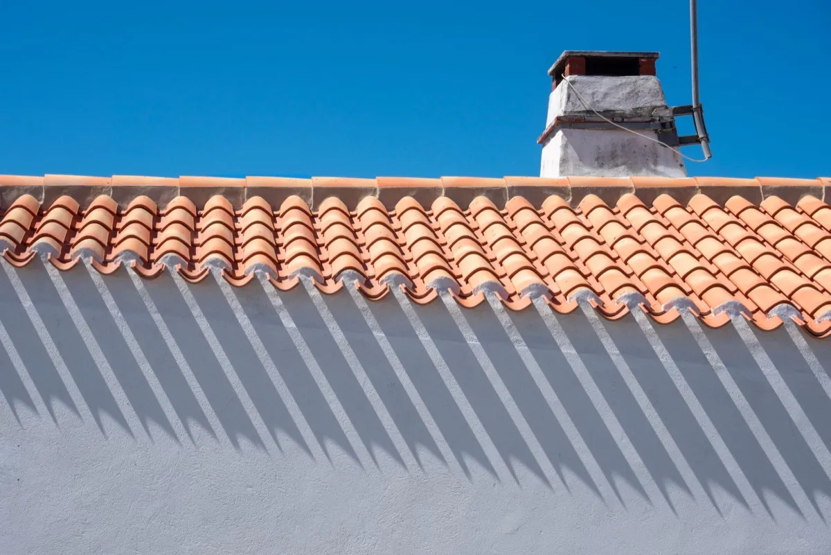 Roof ridge line and chimney on a home in Farmington, NM