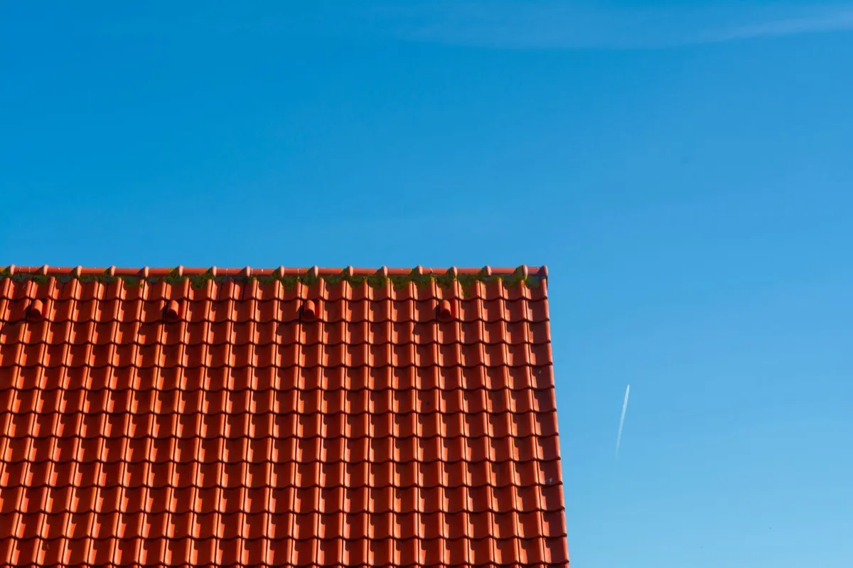 Tile roof gable in full sun, the kind of exposure that sets roof life in Farmington, NM